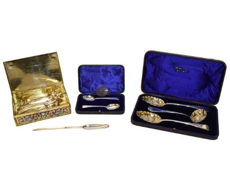 A collection of silver flatware, including: a cased pair of Victorian berry spoons and a sifting spoon en suite, a marrow sco