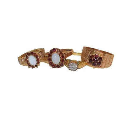 Two 9 carat gold opal and garnet cluster rings, finger size G and N1/2 (a.f.), a 9 carat gold garnet cluster ring, finger siz