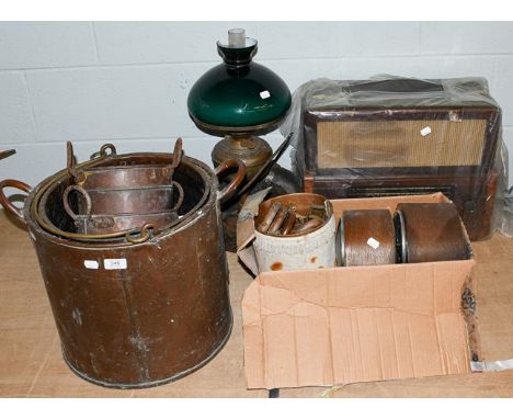 A Victorian oil lamp with green glass shade, various copper pans and pails, a Pilot valve radio, two 1920's oak mantel timepi