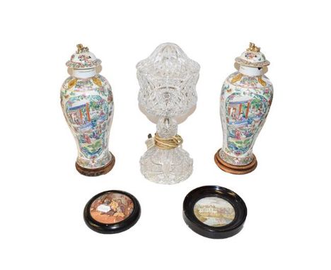 A pair of 19th century Cantonese vases and covers raised on hardwood plinths (a.f.), 35cm, a cut glass table lamp and shade, 