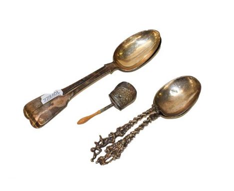 Five various silver spoons, comprising: a George III silver caddy spoon, by Thropp &amp; Taylor, Birmingham, 1812, with shove