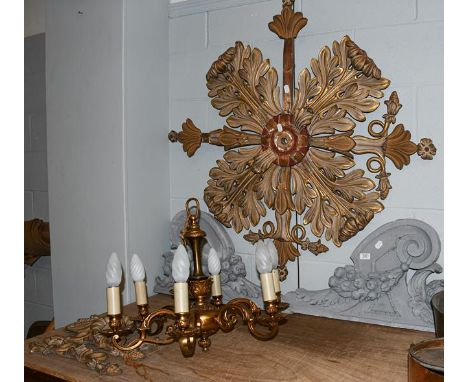 A parcel gilt and painted ceiling rose (a.f.), ornamental door mouldings, and a six light chandelier