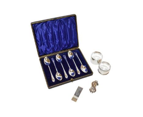 A cased set of six silver tea spoons, a silver clip stamped Tiffany &amp; Co 925, another silver clip stamped 925, and two si