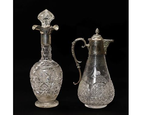 A George V silver mounted cut glass decanter with three pouring spouts by Goldsmiths and Silversmiths Co Ltd, London, 1922, t