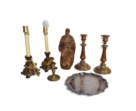 An 18th century Continental parcel gilt carved figure of a Saint, 32cm high, a pair of plated candlesticks (a.f.), a pair of 