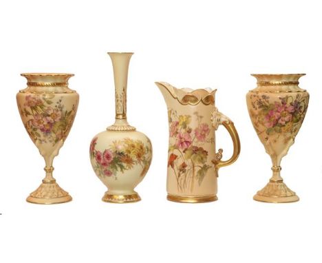 A pair of Royal Worcester blush ware vases, painted with flowers and having claw form pedestals, together with another Royal 