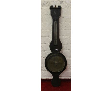 A Georgian mahogany banjo barometer with brass dial by Barnassony, Newcastle.