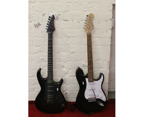 A six string electric guitar Ario Pro II Wild Cat along with a Fender style Elevation electric guitar.