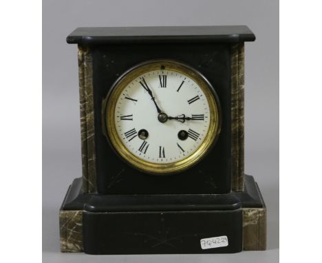 A Victorian marble cased 8 day mantel clock with enamel face.