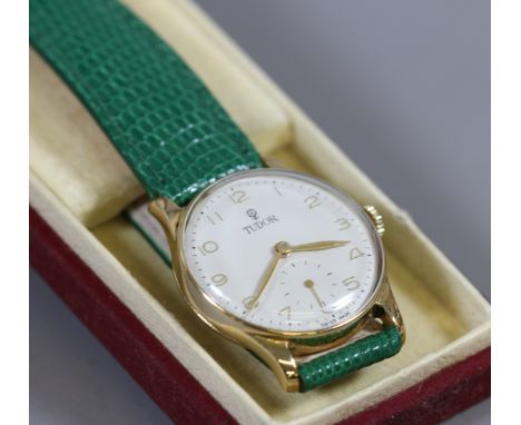 A Rolex Tudor 9ct gold manual wristwatch in original coffin box with satin dial, Arabic numeral markers and subsidiary second