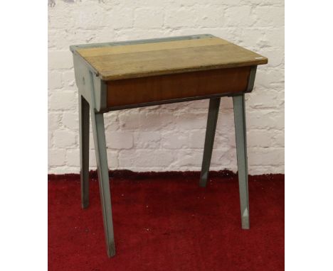 A small metal and ash school desk.