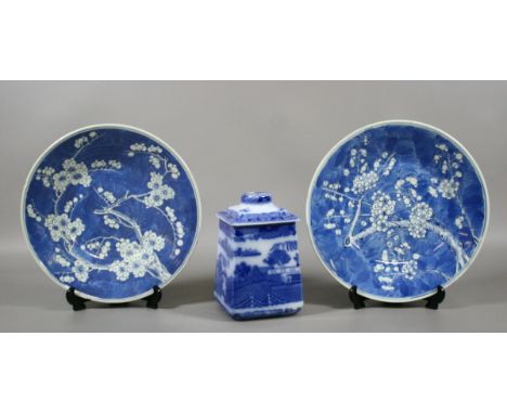 A pair of Chinese decorated cabinet plates along with a Ringtons square formed blue and white tea caddy.