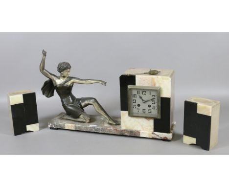 A French Art Deco figural mantel clock garniture circa 1928.