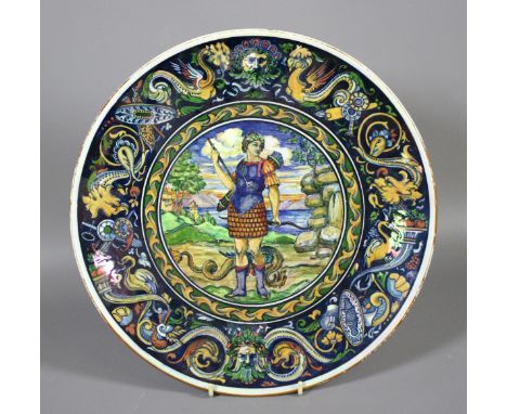 A Grimwades Byzantine ware lustre glazed charger decorated with a mythical hunting figure signed LG Boullemier.