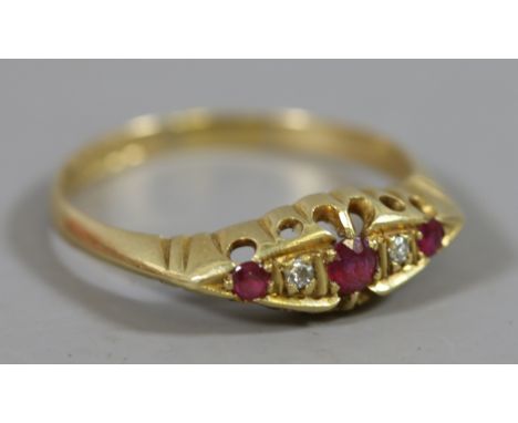 A George VI 18 carat gold ring set with rubies and diamonds assayed Sheffield 1943, size R.5.