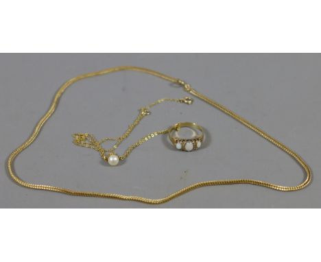A ladies 9 carat gold necklace along with another 9 carat gold necklace and pearl pendant and a yellow metal ring, total weig