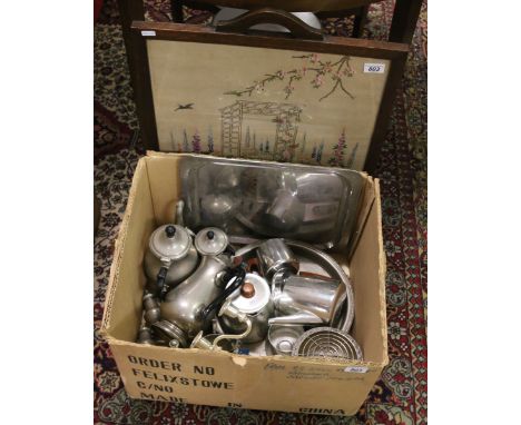 A box of mixed silver plate and metalwares to include tea services, candelabra and trays along with an oak firescreen with em