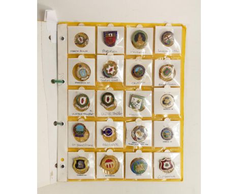 Two pages containing a total of 40 x Irish enamel bowling badges. Vendor states that badges on one page have replacement back