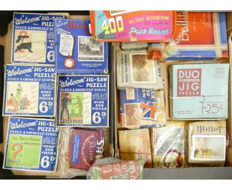 A large  collection of vintage William Ellis and similar vintage jigsaws, games ( 2 trays) 
