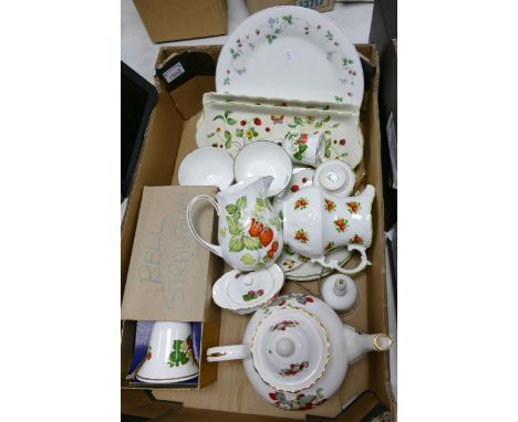 A mixed collection of items with  Strawberry theme including teapot, jugs plates, trays etc 