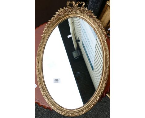 Oval gilt portrait wall mirror 