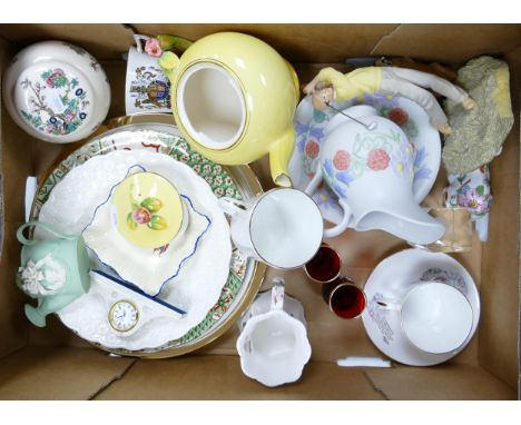 A mixed collection of items to include Royal Winton / Grimwades teapot, decorative wall plates, resin golfer figure etc 