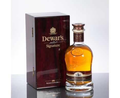 DEWAR'S SIGNATURE
Blended Scotch Whisky. Bottle No. A 32295. 70cl, 43% volume, in wooden presentation box.
 CONDITION REPORT: