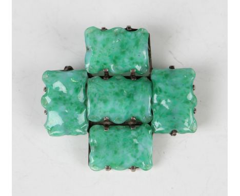 A Chinese apple green jade brooch with silver mounts, early 20th century, set with five shaped rectangular jade panels formin