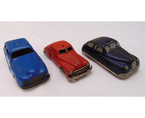 Three vintage tin plate motor cars to include Chad Valley, Harborne and Gama, all play worn