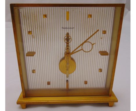 Jaeger LeCoultre rectangular gilt metal mantle clock on four peg feet, 16 x 16.5 x 4cm