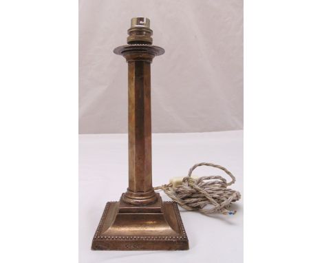 A Victorian hallmarked silver table candlestick of facet columnular form on raised square base with beaded borders, Sheffield