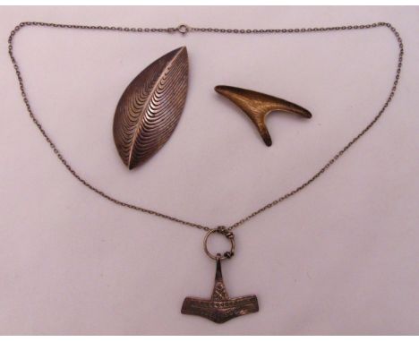 A quantity of Danish and Norwegian vintage hallmarked sterling silver jewellery to include two leaf shaped brooches and a pen