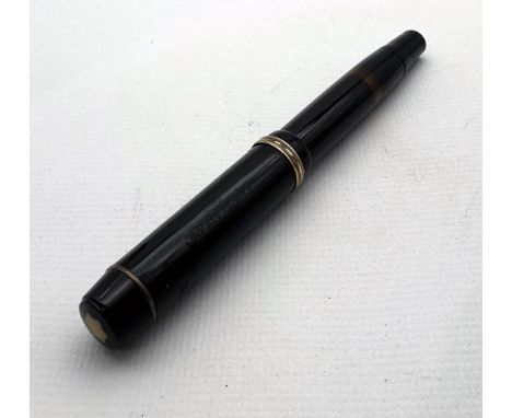 Kolbenfüller Montblanc. Nr. 234 ½ / KOB. 585/000 Montblanc Goldfeder. Clip abgebrochen. 