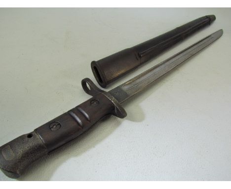 US Remington bayonet dated 1917 with leather and metal scabbard