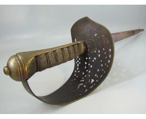 Antique officers sword with carved metal hilt and sharkskin handle. Leather scabbard A/F