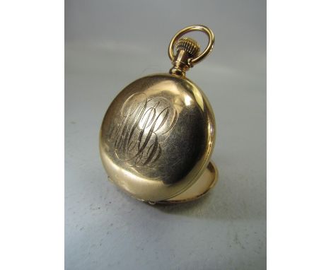 14 carat gold Pocket watch with engraved decoration. Z M Leger Moncton.