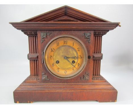 Architectural mahogany mantle clock with gilded face
