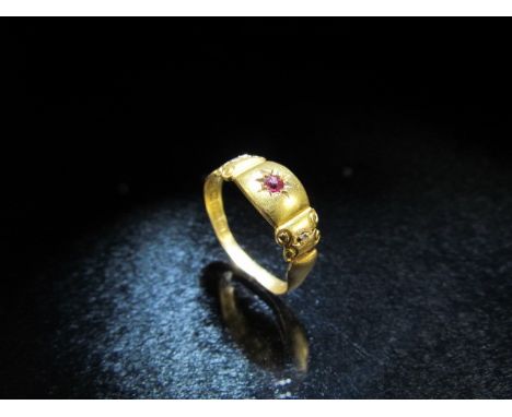 15ct Gypsy style gold ring set with ruby and two diamond studs. 1.2g A/F