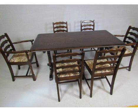 Darkwood Ercol dining table and darkwood chairs