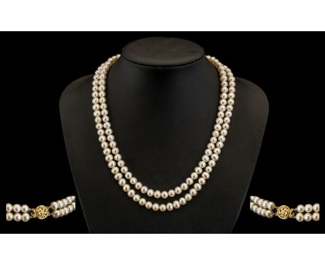 Ladies Nice Quality Double Strand Cultured Pearl Necklace - with 9ct gold clasp, fully hallmarked and well matched. 18 inches