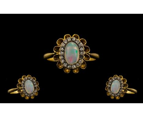 Antique Period 18ct Gold Pleasing Rose Cut Diamond and Opal Set Dress Ring of pleasing form. Flower head setting. Marked 18ct