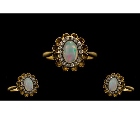 Antique Period 18ct Gold Pleasing Rose Cut Diamond and Opal Set Dress Ring of pleasing form. Flower head setting. Marked 18ct