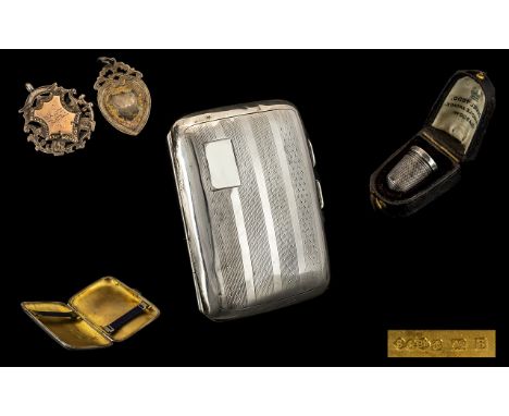 Collection of silver. Cigarette case Birmingham 1926, silver hall marked running medal and shield fob, silver thimble in case