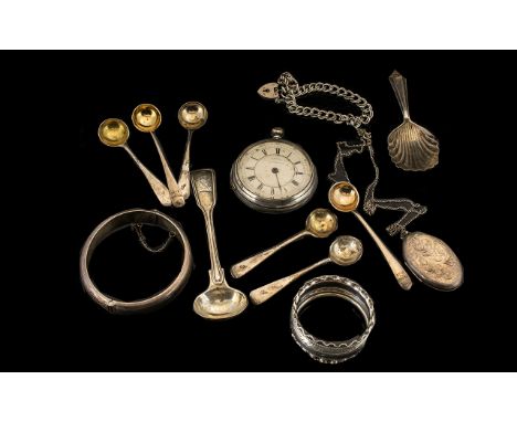 Collection Of Silver. Pocket watch, caddy spoons, bangle, napkin ring, locket with chain, bracelet, all items fully Hallmarke