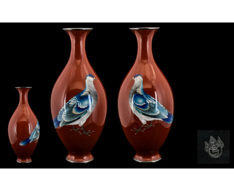 A Pair of Large Japanese Cloisonne Enamel Vases Gonda Hirosuke, Meiji period. Silver wire cloisonne vases, deep red ground wi