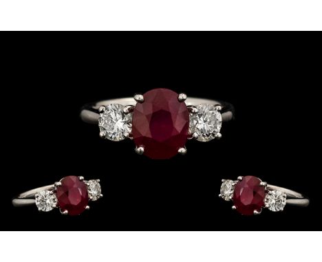 18ct White Gold - Nice Quality &amp; Attractive Ladies 3 Stone Ruby &amp; Diamond Dress Ring.  Ring Size M.  The central natu