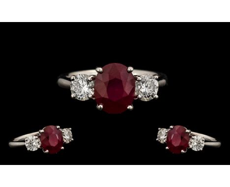 18ct White Gold - Nice Quality &amp; Attractive Ladies 3 Stone Ruby &amp; Diamond Dress Ring.  Ring Size M.  The central natu