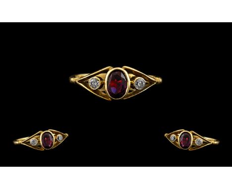 18 CT Gold Attractive 3 Stone Garnet &amp; Diamond Dress Ring. Open work setting. Marked 18.750. Hall marked Birmingham 1918.