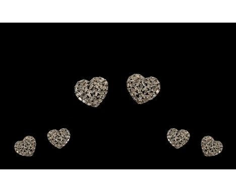 Diamond Heart Shape Stud Earrings, baguette cut diamonds totalling .5ct set in a 'firework' formation encouraging the light t