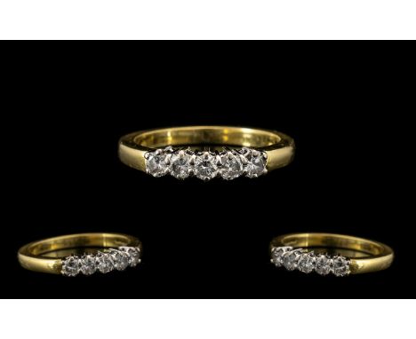 18ct Gold Pleasing 5 Stone Diamond Set Ring Channel Set full hallmark for 18ct. The 5 round brilliant cut diamonds of good co